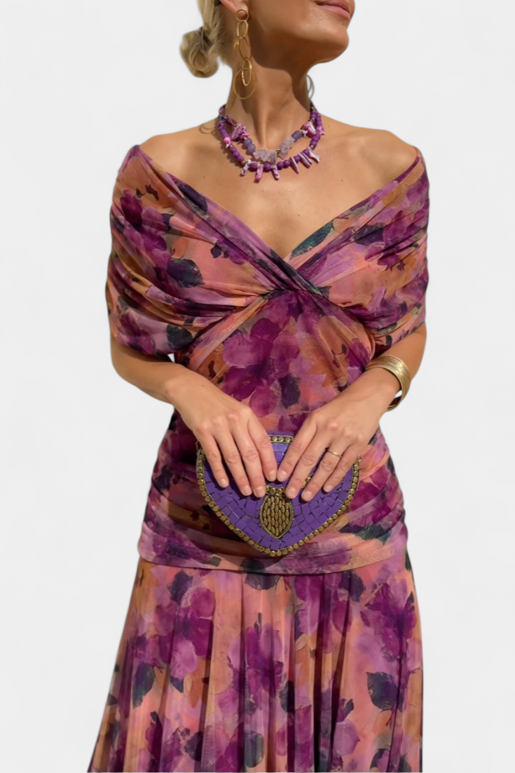 Captivating women's floral maxi dress from a unique angle, highlighting its elegant flowy silhouette.