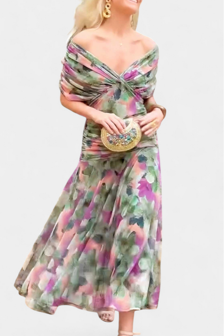 Women's elegant floral maxi dress worn outdoors, showcasing its captivating flowy design for summer occasions.