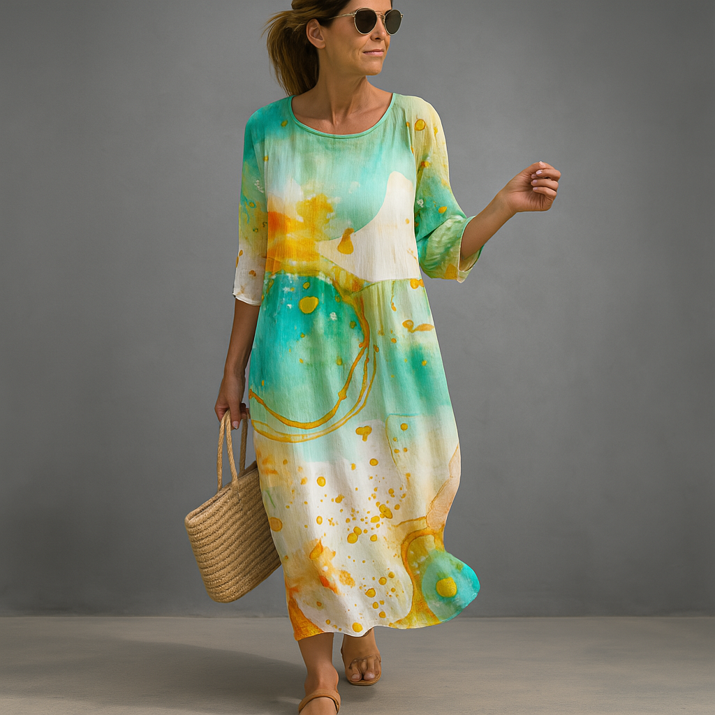 Stylish women's summer floral midi dress. Ideal elegant party or occasion dress in a comfortable blue and green pattern.