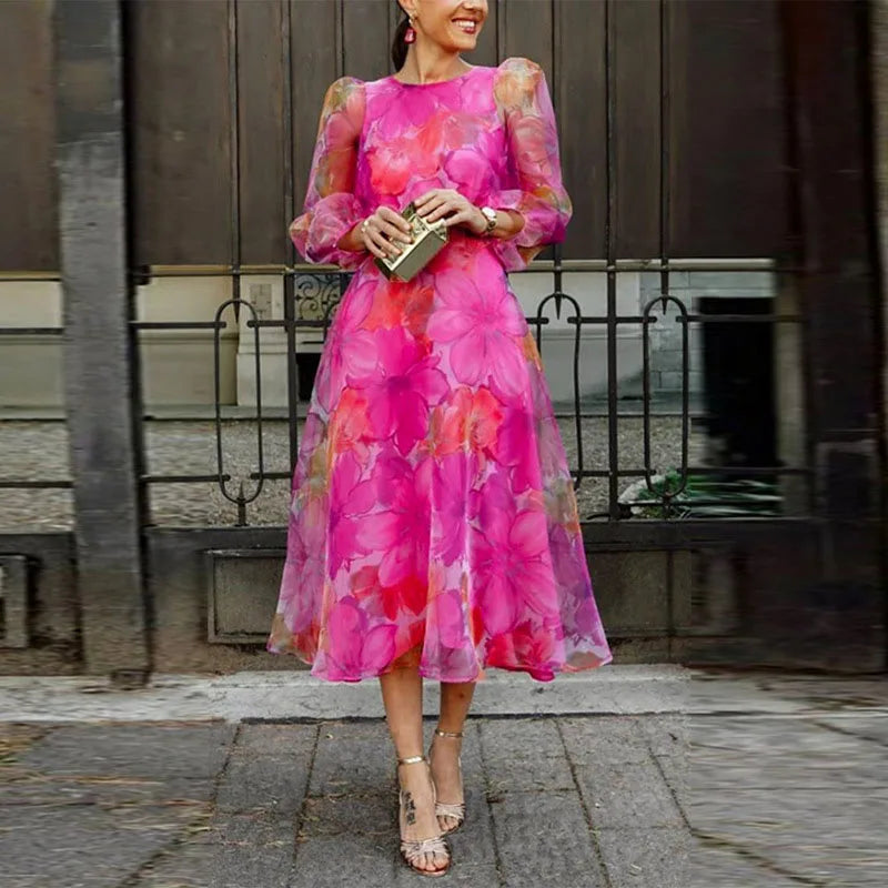 Elegant women's floral midi dress, perfect for wedding guests, with long sleeves & a formal design.