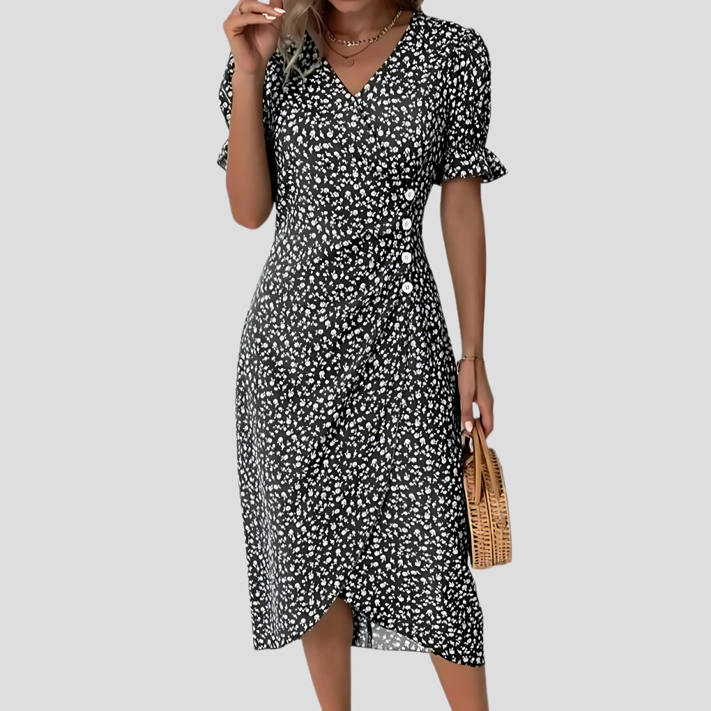Women's A-line floral midi dress with V-neck & puff sleeves, suitable for elegant summer or spring events.