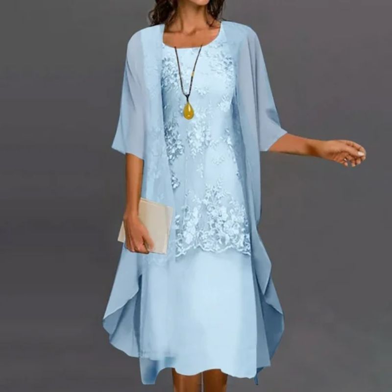 Versatile women's two-piece floral print midi dress and sheer cardigan set, ideal for layered elegant fashion.