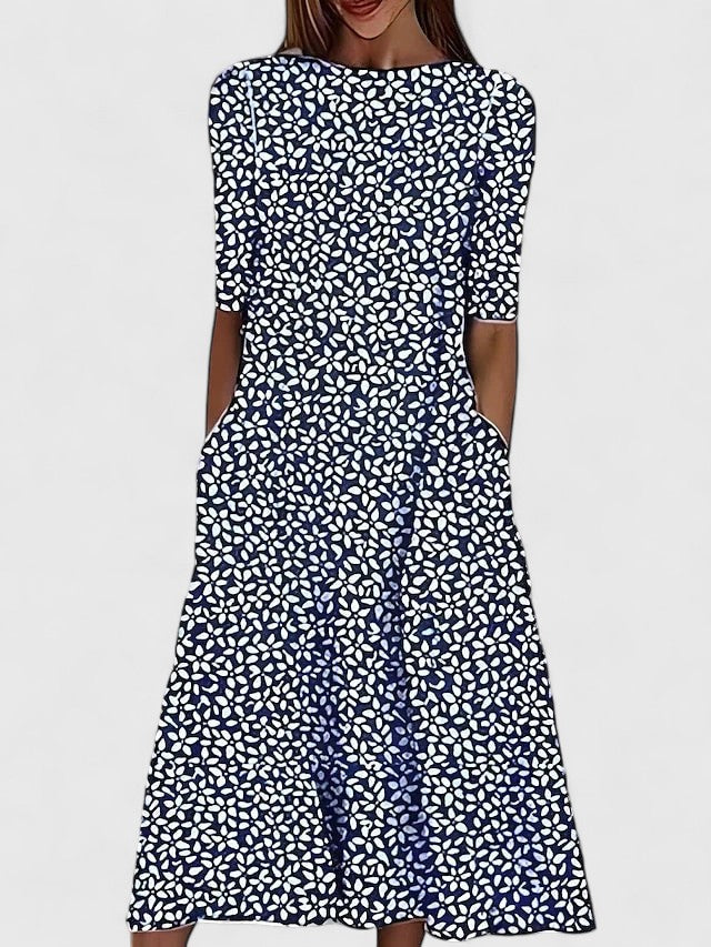 Stylish women's floral print midi dress. Elegant boat neck, sleeveless, and functional pockets for versatile wear.