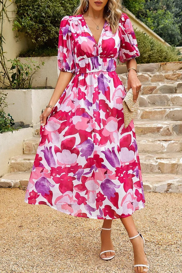 Women's summer floral midi dress with chic puff sleeves, V-neck, ideal for garden party fashion.