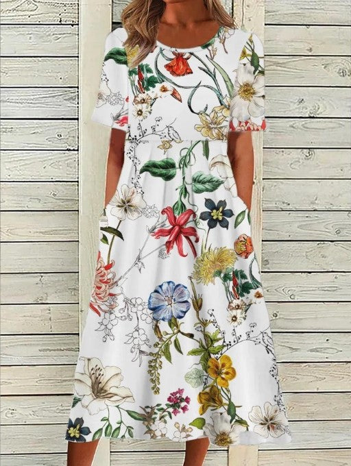 Stylish women's day dress: floral midi design, short sleeve, round neck, & convenient pockets for an elegant look.