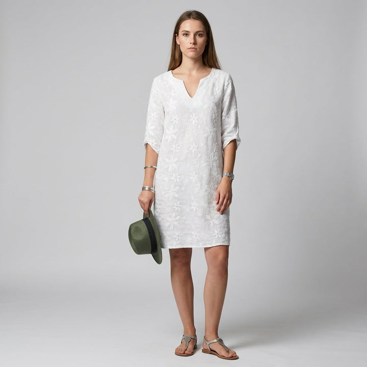 Elegant women's floral midi dress with V-neckline & half sleeves. Perfect for spring & summer occasions.