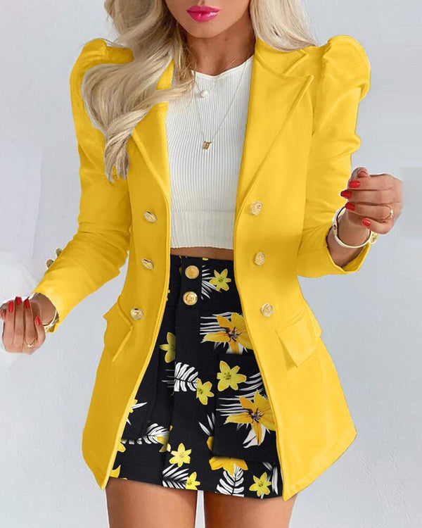 Stylish women's workwear: elegant floral print blazer and matching skirt co-ord set.