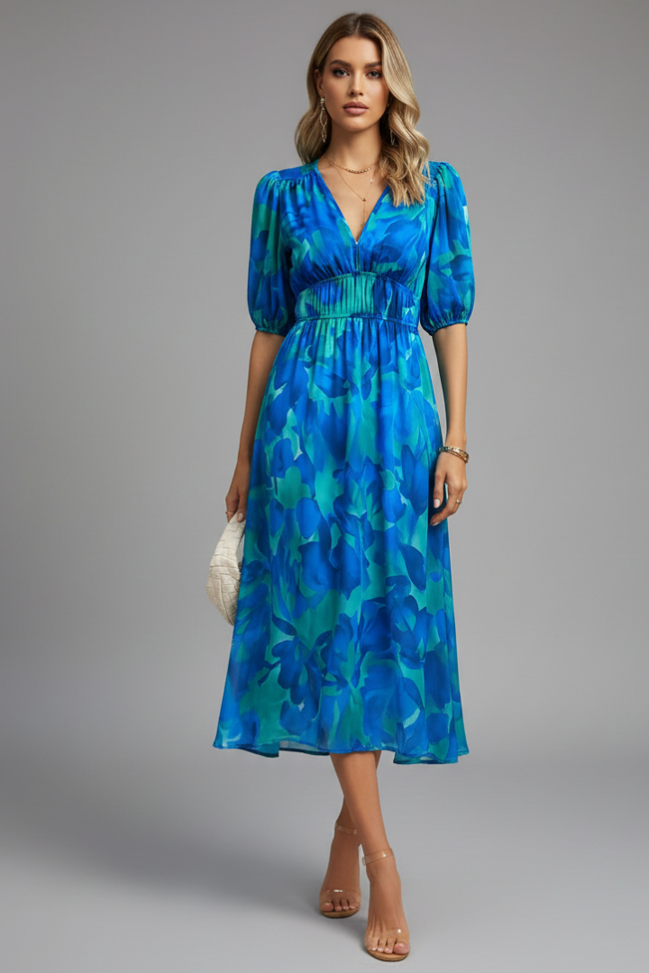 Feminine floral puff sleeve V-neck midi dress for women, featuring a vibrant print & flattering gathered waist.