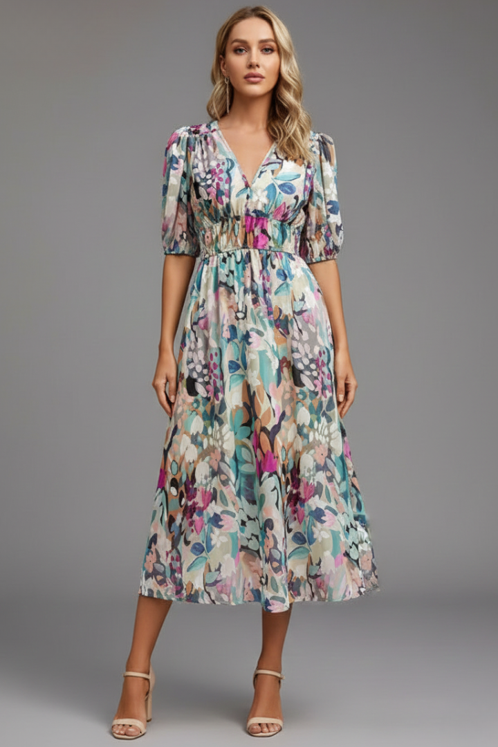 Beautiful floral print midi dress for women, featuring chic puff sleeves, a V-neck, and a flattering gathered waist.