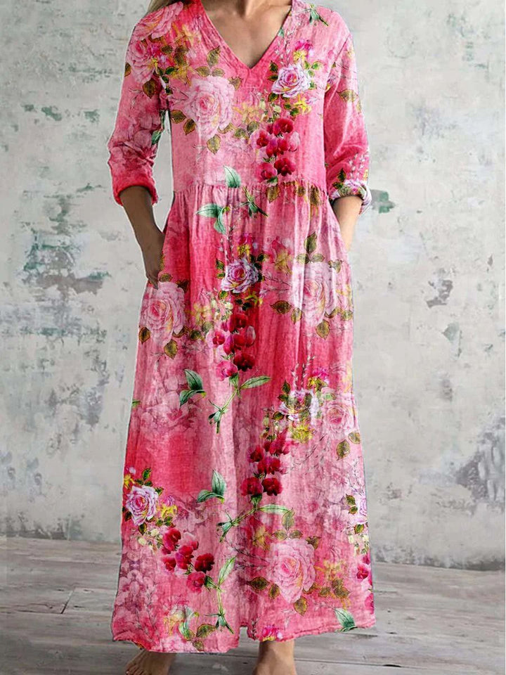 Elegant women's spring/summer maxi dress, featuring a V-neck, long sleeves, and a charming floral print with a relaxed fit.