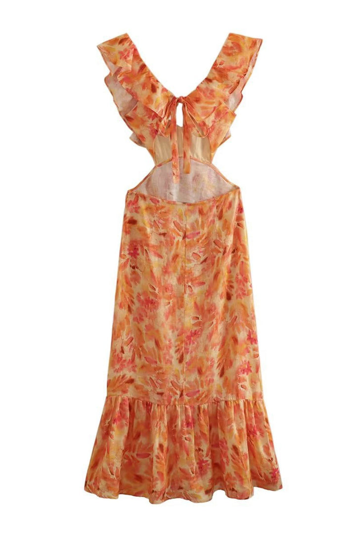 Close-up of the floral print on a women's elegant ruffle maxi dress