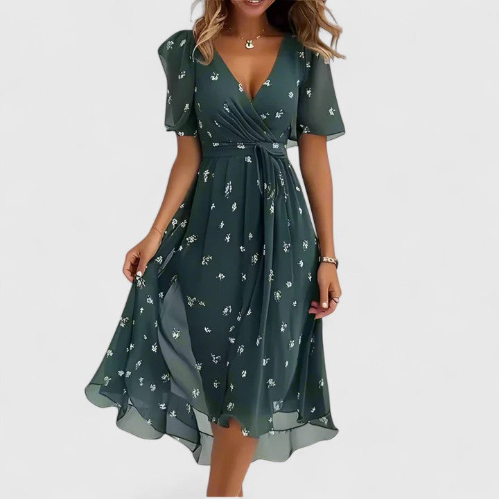 Trendy women's floral short dress, V-neck, flutter sleeves, and elegant high-low hem, ideal for summer fashion.