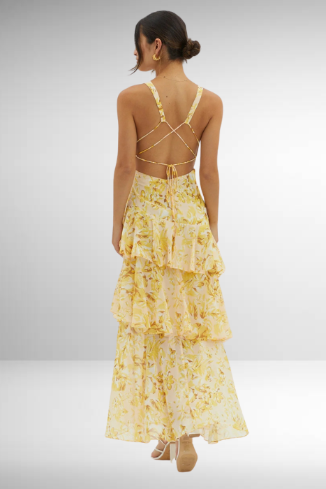 Women's tiered floral maxi dress, designed for elegance and comfort in spring.