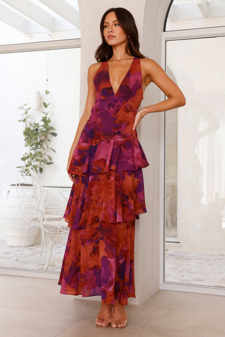 Tiered floral maxi dress, a chic women's sleeveless dress for elegant spring wear.