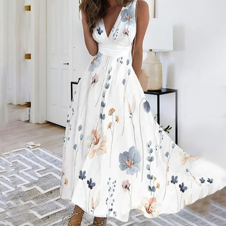 Sleeveless maxi dress for women featuring a vibrant floral pattern, suitable for summer fashion.