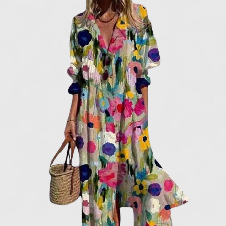 Woman wearing an elegant flowy boho maxi dress. Ideal for summer, vacation, or chic casual occasions.
