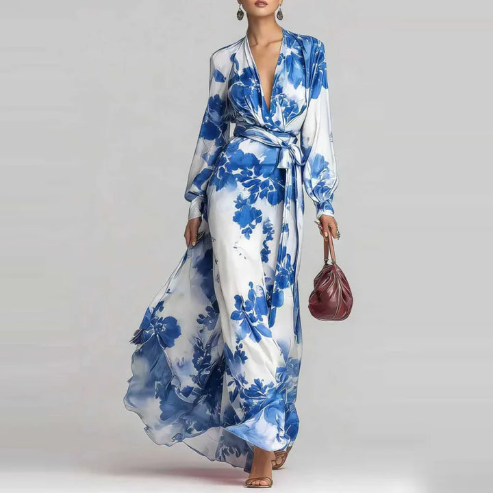 Stylish woman in a long flowy floral maxi dress, ideal for spring attire, summer events, or as an elegant party gown.