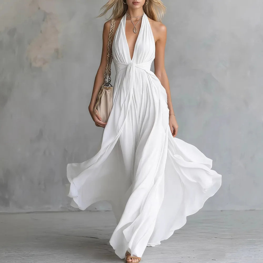 Women's halter neck pleated maxi evening dress. Backless, elegant, ideal for parties & formal events.