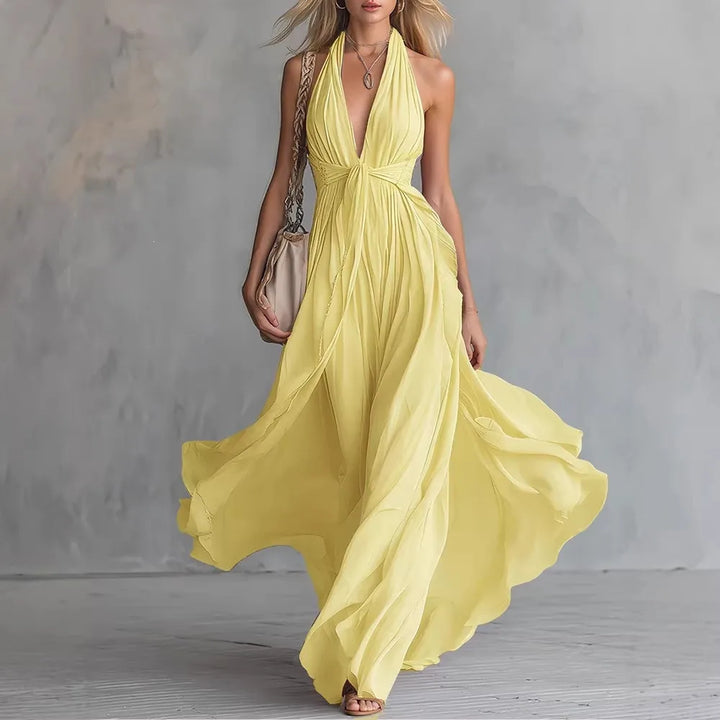Beautiful women's long flowy evening gown. Maxi formal dress for weddings, galas, or special occasions.
