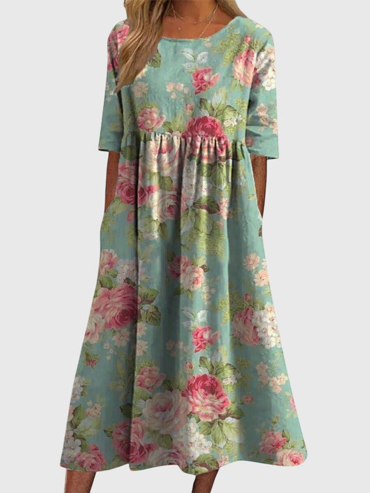 Embroidered women's versatile dress. Flowy, flattering, and chic for elegant or casual summer occasions.