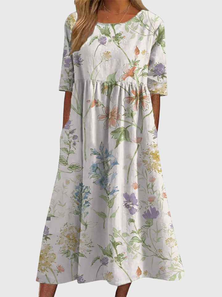 Chic women's summer dress. Flowy, flattering, and comfortable, ideal for versatile casual elegance.