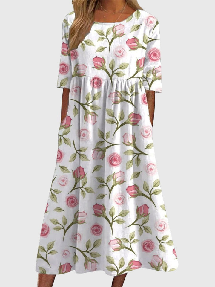 Flattering elegant women's flowy dress. Comfortable embroidered design for chic summer casual style.