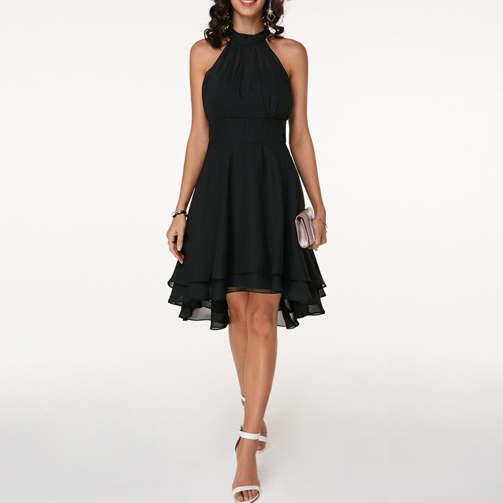 Stunning blue women's sleeveless mini dress with elegant halter neckline & flowing fluid drape.