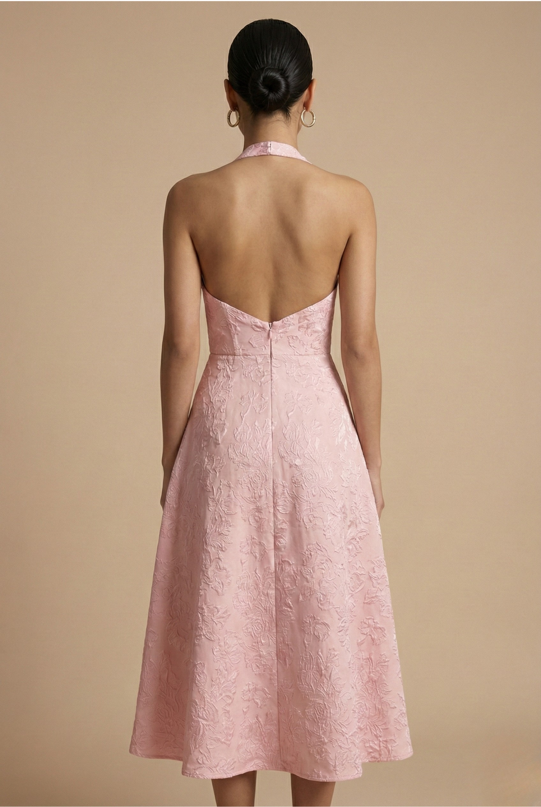 Chic women's A-line midi dress, halter neck & corset detail. Ideal for wedding guests & special occasions.