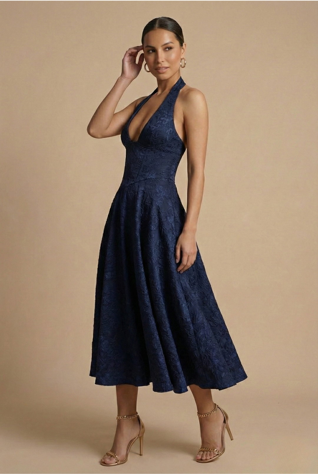 Glamorous women's A-line midi dress with halter neck & corset detailing. Ideal for parties & formal events.