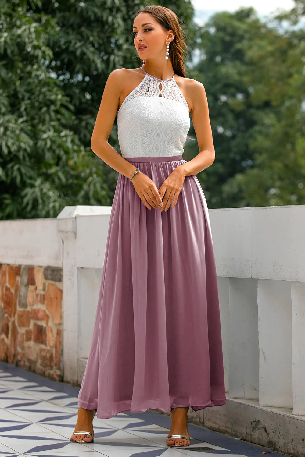 Contemporary design of a women's long halter dress, a perfect choice for modern formal wear.