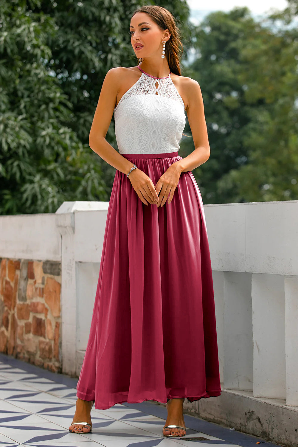 Textured fabric detail of a women's formal halter dress, emphasizing luxury evening wear.