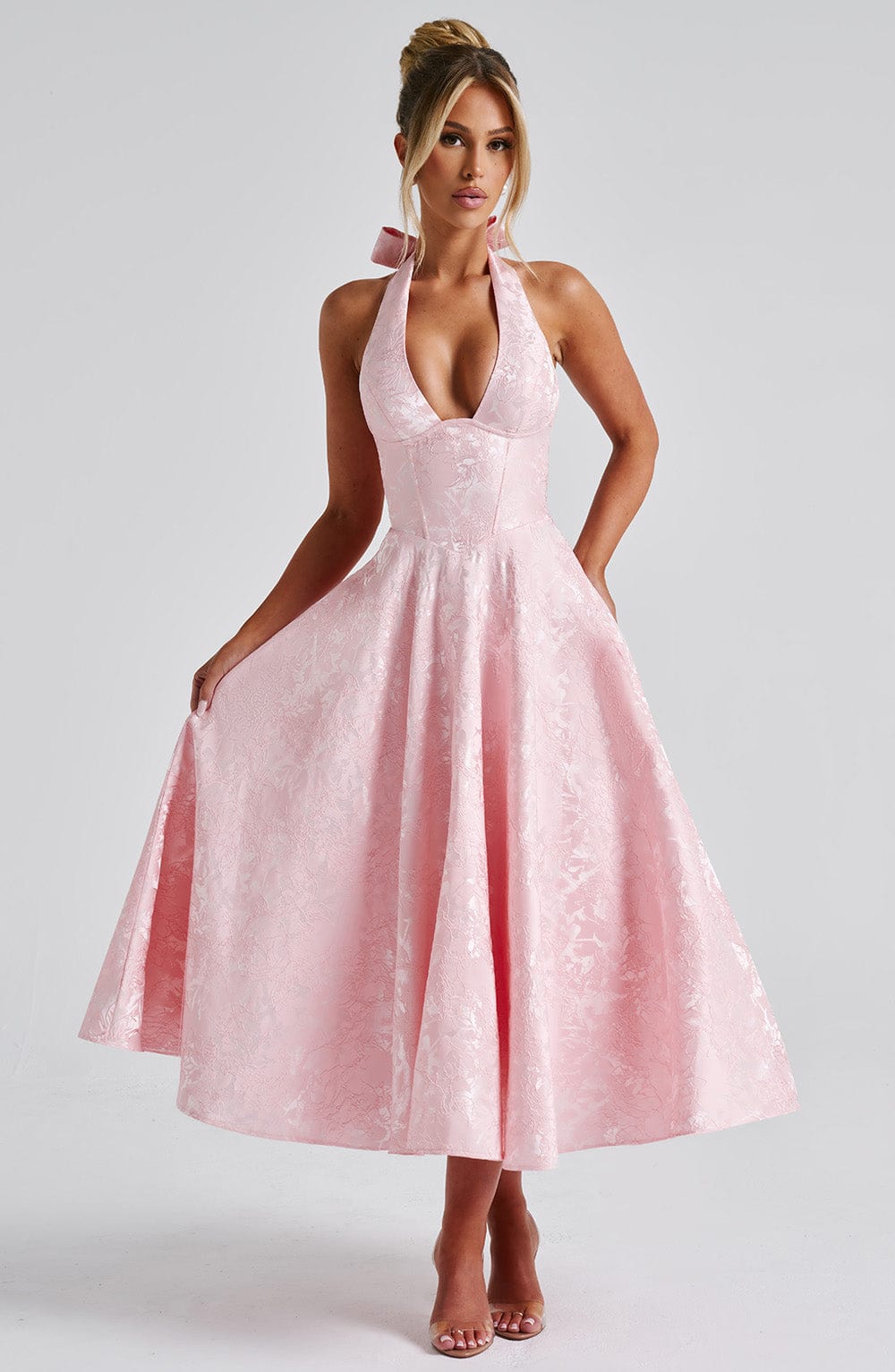 Elegant women's halter neck midi dress for wedding guest or formal event, sophisticated style