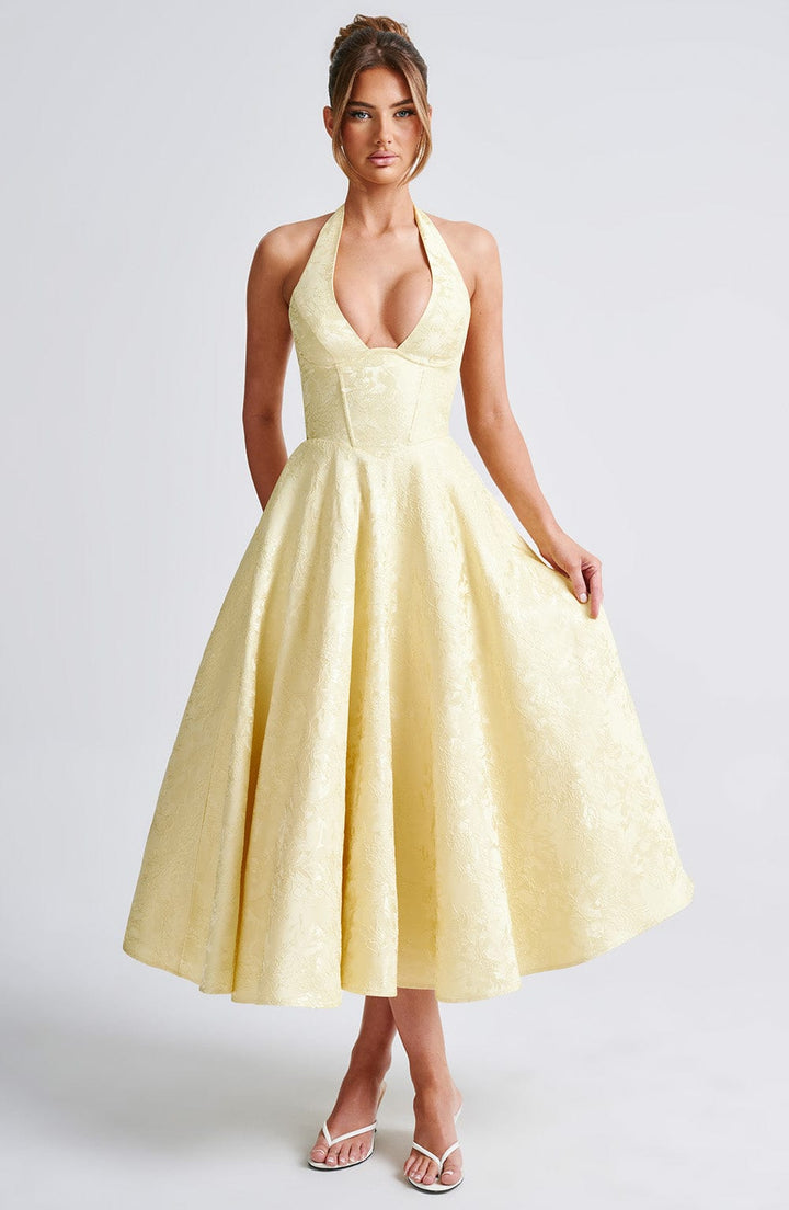 Chic women's formal halter neck midi dress, an essential piece for wedding guest attire
