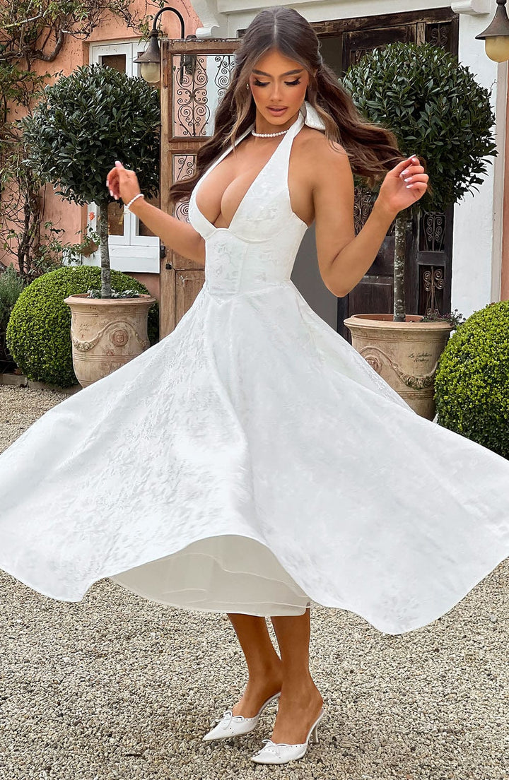 Women's cocktail dress, an elegant halter neck midi style, suitable for various celebrations