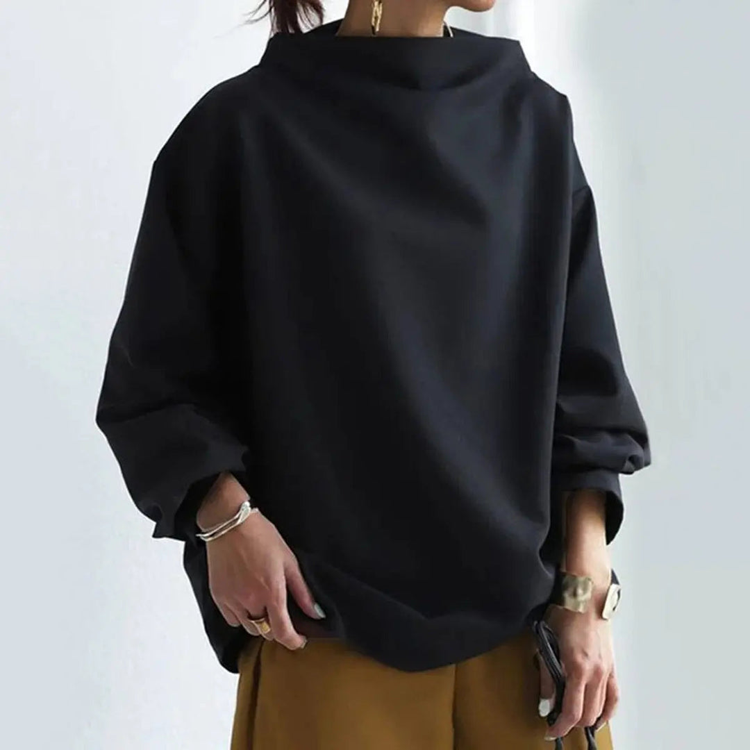 Modern women's high-neck top with tailored fit, showcasing elegant style for any occasion.