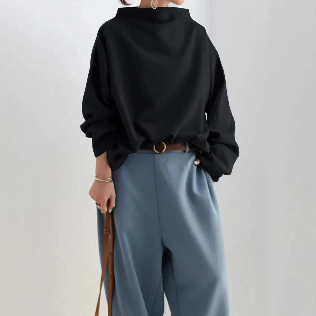 Sophisticated women's high-neck top, an essential long-sleeve wardrobe staple for elegant fashion.