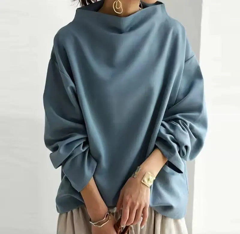 Fashionable women's high-neck long-sleeve top, a versatile piece for a chic and modern wardrobe.