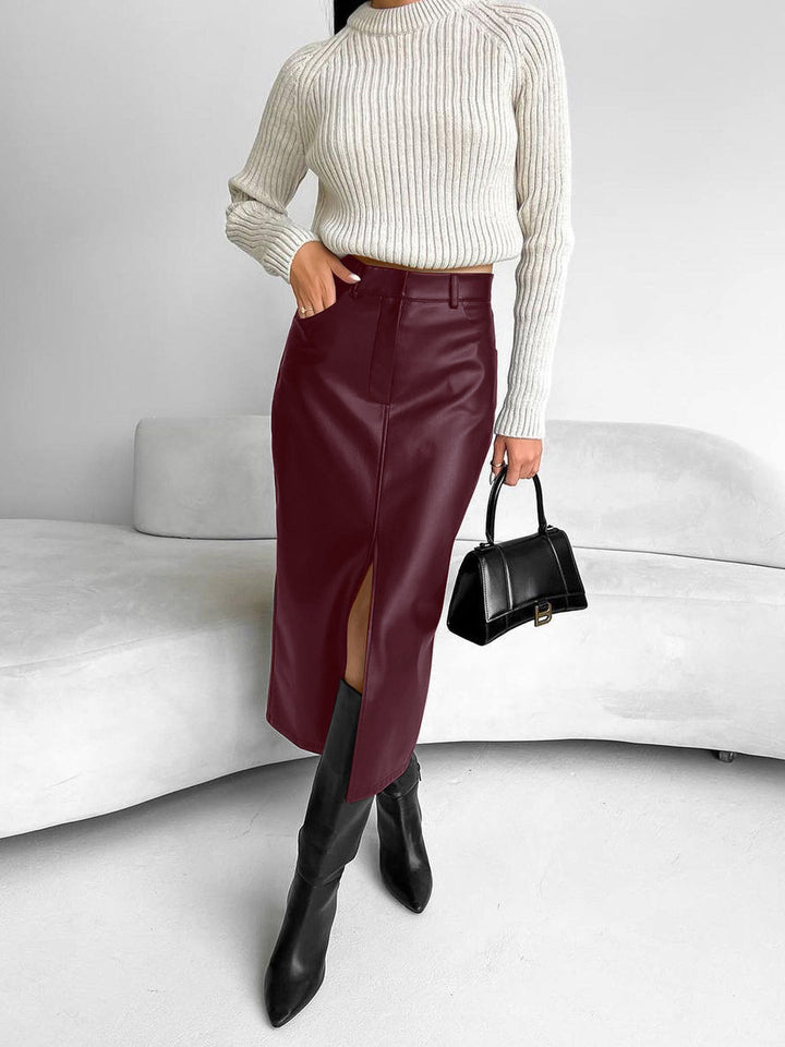 Versatile black high-slit midi skirt for women, ideal for both casual and workwear