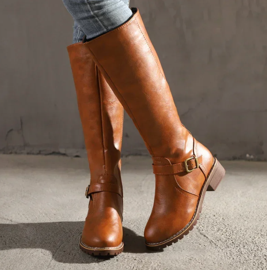 Elegant women's knee-high leather boots in rich brown, perfect for fall fashion