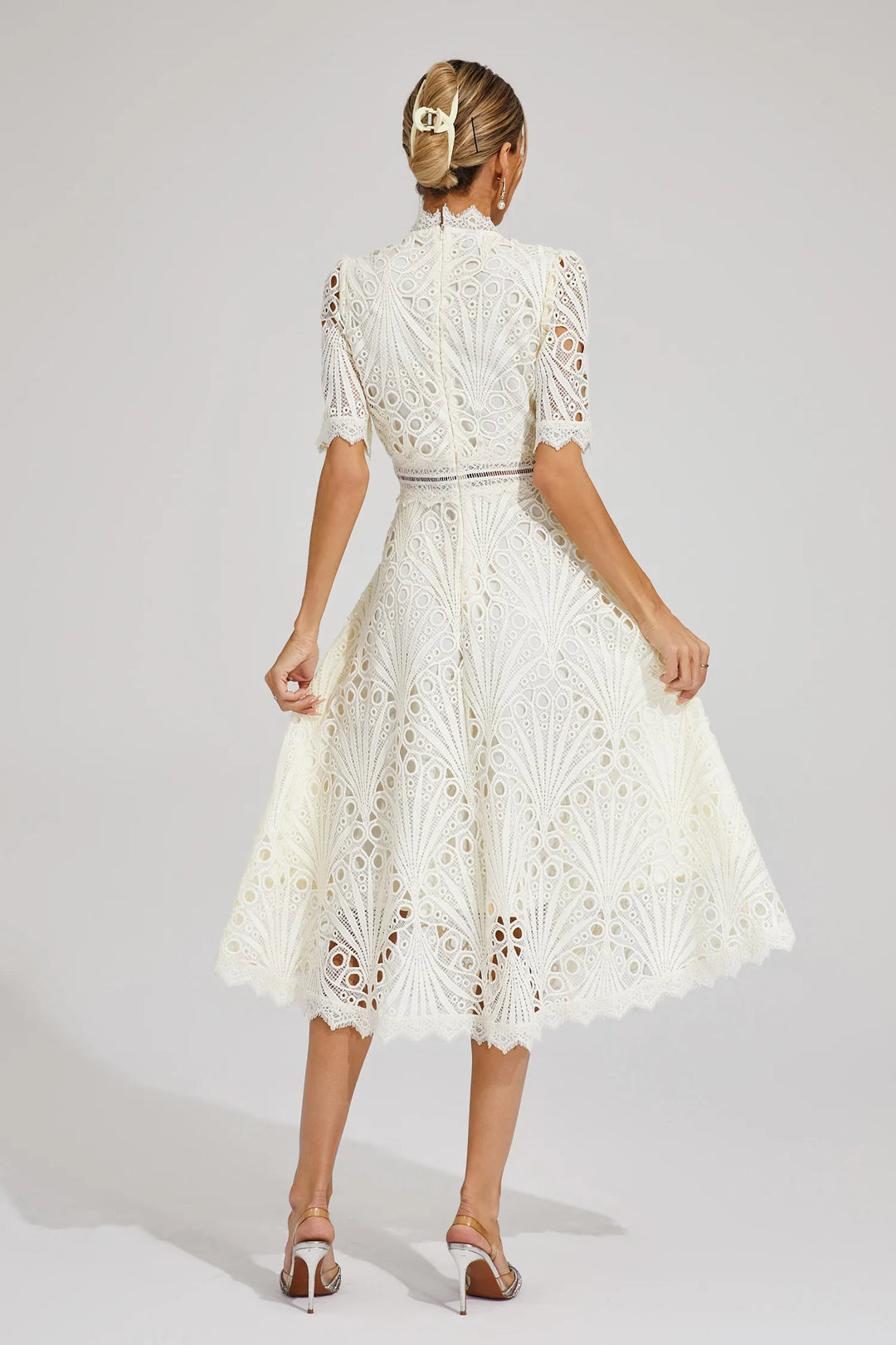 Beautiful women's lace midi dress, a sophisticated choice for special events.