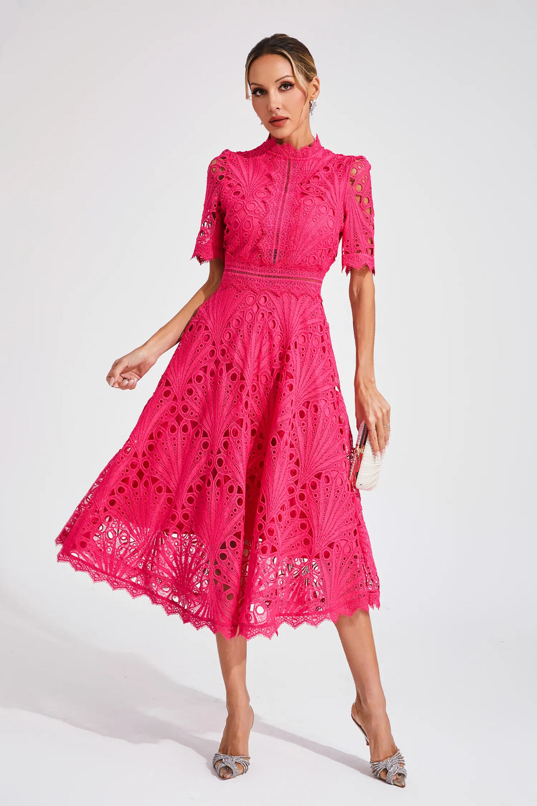 Sophisticated women's lace midi dress, suitable for parties and formal gatherings.