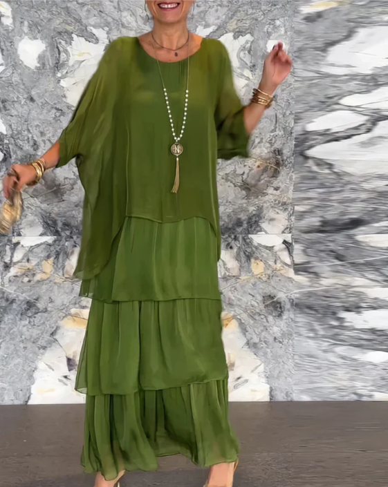 Bohemian chic women's layered maxi dress with flowy A-line silhouette, ideal for elegant casual wear.