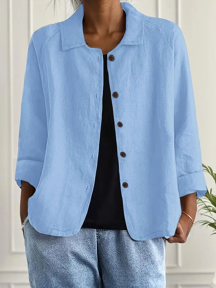 Elegant women's long sleeve button-up blouse, perfect for office wear or stylish casual outfits.