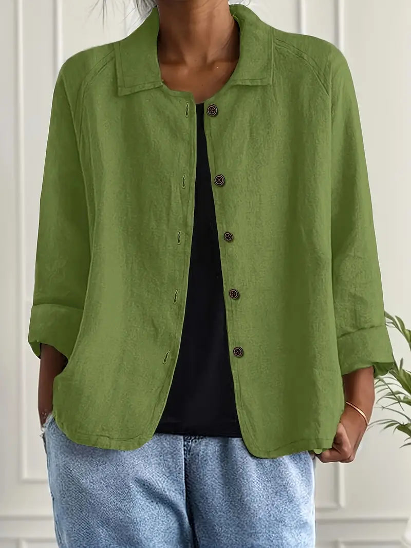 Stylish women's button-up blouse with long sleeves, perfect for a chic casual look or smart office attire.