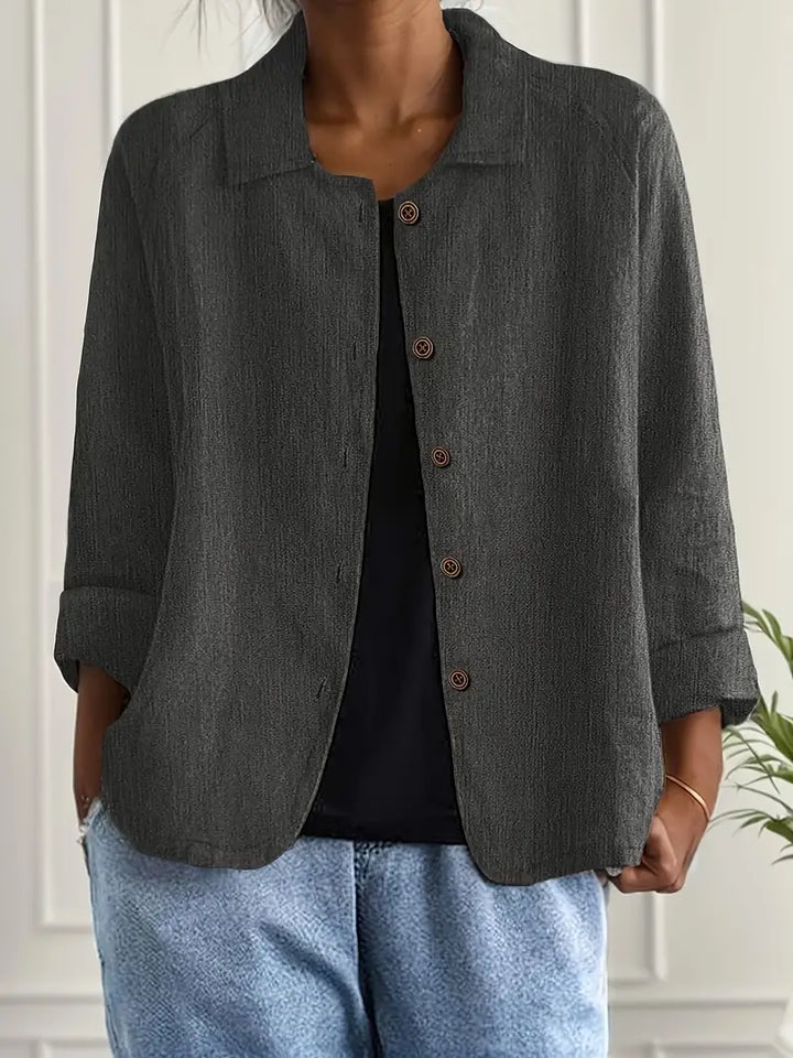 Versatile women's long sleeve button-up blouse, an essential piece for any wardrobe, casual or dressy.