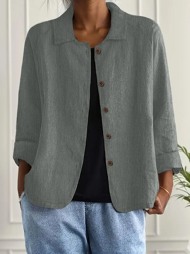 Effortless women's elegant long sleeve blouse, a classic button-up shirt designed for stylish everyday wear.