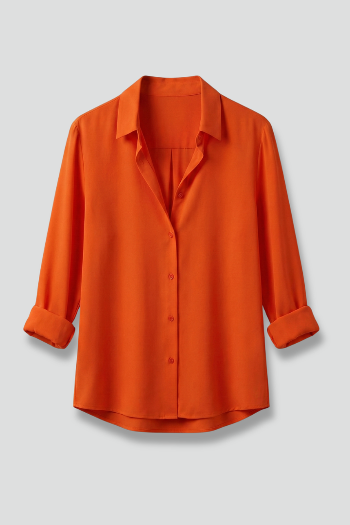 Elegant women's long sleeve button-up blouse. Versatile collared top perfect for professional office wear.
