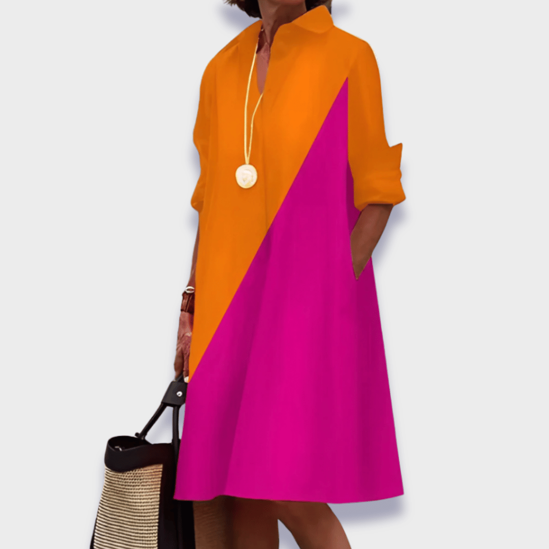 Stylish women's long sleeve collared midi dress. Elegant polo design, great for day to evening.