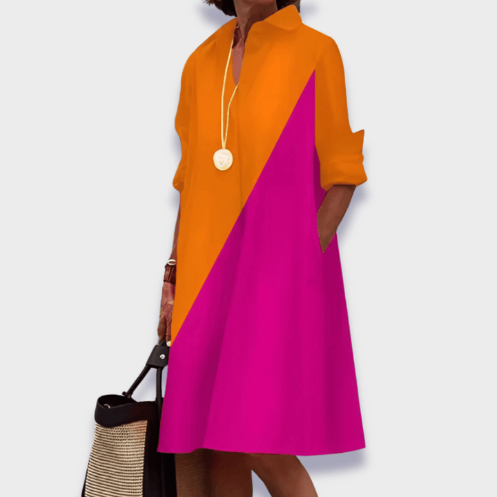 Stylish women's long sleeve collared midi dress. Elegant polo design, great for day to evening.