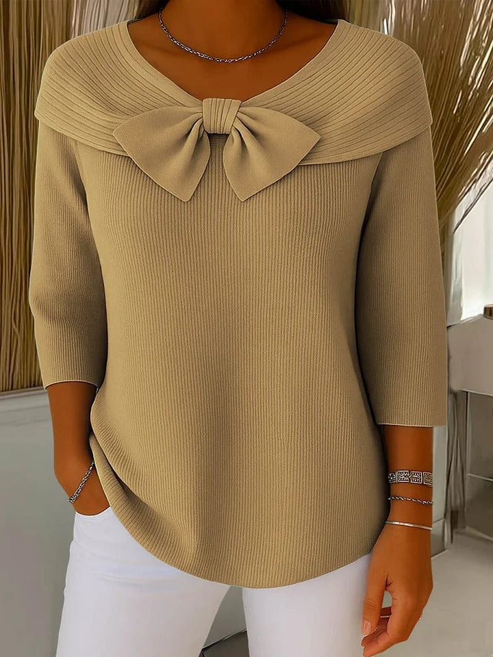 Cozy women's fall/winter sweater, an elegant long sleeve top with a flattering bow detail.